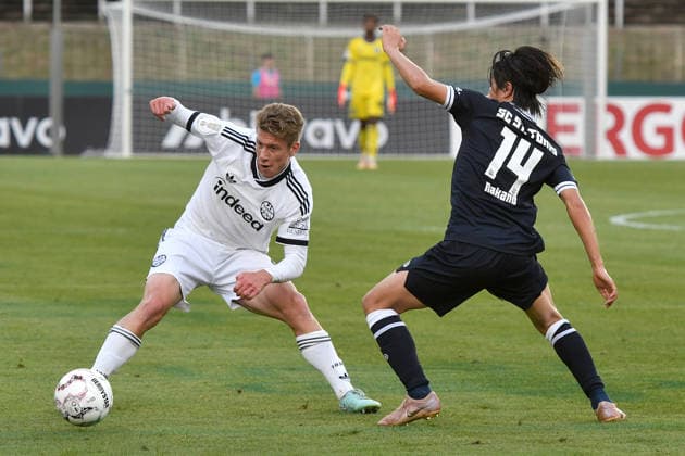 v. li. im Zweikampf Elias Baum (Eintracht Frankfurt 2) Kohei Nakano (St. Tönis 14) 21.08.2026 ¢ Fussball ¢ SC St. Tönis vs Eintracht Frankfurt, Grotenburg-Stadion, Krefeld, DFB DFL REGULATIONS PROHIBIT ANY USE OF PHOTOGRAPHS AS IMAGE SEQUENCES AND OR QUASI-VIDEO NRW Germany *** From left: Elias Baum (Eintracht Frankfurt) and Kohei Nakano (St. Tönis) in a one-on-one battle, August 14, 2026 ¢ Soccer ¢ SC St. Tönis vs. Eintracht Frankfurt, Grotenburg Stadium, Krefeld, DFB DFL regulations prohibit any use of photographs as image sequences and or quasi-video NRW Germany Copyright: xpepphotox xSaschaxWeizx pep00321, pep_20260821_hm