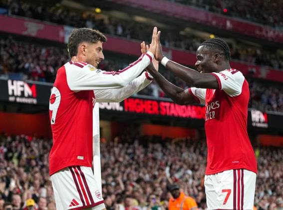 Kai Havertz celebrates scoring the opening Arsenal goal with Bukayo Saka (right) Arsenal v Coventry City, Premier League, Football, Emirates Stadium, London, UK - 21 Aug 2026London Emirates Stadium United Kingdom EDITORIAL USE ONLY No use with unauthorised audio, video, data, fixture lists, club league logos or live services. Online in-match use limited to 120 images, no video emulation. No use in betting, games or single club league player publications.  Copyright: xWiredxPhotos Shutterstockx 17111592ac
