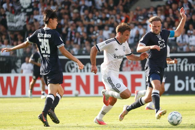 Krefeld, Deutschland 21. August 2026: DFB-Pokal - 2026 2027 - 1. Runde - SC St. Tönis 1911 20 gegen Eintracht Frankfurt Im Bild: v. li. im Zweikampf Fumito Okihara (Tönis), Mario Götze Goetze (Frankfurt) und Max Pohlig (Tönis) DFB DFL regulations prohibit any use of photographs as image sequences and or quasi-video Grotenburg Nordrhein Westfalen *** Krefeld, Germany, August 21, 2026, 2026–2027 DFB Cup, First Round: SC St. Tönis 1911 20 vs. Eintracht Frankfurt. Pictured, from left, in a tackle: Fumito Okihara (Tönis), Mario Götze (Frankfurt) and Max Pohlig (St. Tönis). DFB and DFL regulations prohibit any use of photographs as image sequences and or quasi-video. Grotenburg, North Rhine-Westphalia Copyright: xFotostandx xvanxderxVeldenx
