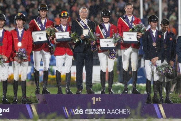 Das Deutsche Spring Team ist Weltmeister, v.l.n.r. Richard VOGEL, Marcus EHNING, Bundestrainer Otto BECKER, Sophie HINNERS und Daniel DEUSSER, mit Gold-Medaillen, Jubel, Lachen, Freude, bei der Siegerehrung, S2: 2. Umlauf FEI Jumping World Championship, WM, Weltmeisterschaft - Team, am 21.08.2026, FEI Reit Weltmeisterschaft Aachen 2026 vom 11. - 23.08.2026 in Aachen Deutschland; Â *** The German show jumping team is the world champion. From left to right: Richard VOGEL, Marcus EHNING, national team coach Otto BECKER, Sophie HINNERS, and Daniel DEUSSER, with gold medals, cheering, laughter, and joy at the award ceremony for the S2 2-round FEI Jumping World Championship Team event on August 21, 2026, FEI World Equestrian Games Aachen 2026, August 11–23, 2026, in Aachen, Germany Â