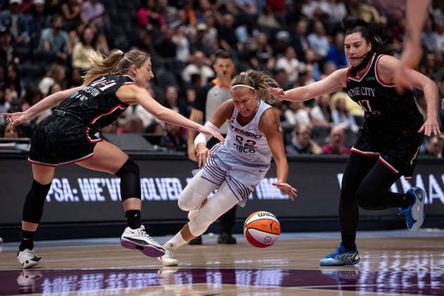 August 21, 2026, Vancouver, Bc, CANADA: Toronto Tempo s Julie Allemand (22) is stopped by Portland Fire s Karlie Samuelson (44) as Megan DiLeo (17) watches during the first half of a WNBA, Basketball Damen, USA basketball game in Vancouver, on Friday, August 21, 2026. Canada News - August 21, 2026  - ZUMAc35_ 20260821_zaf_c35_211 Copyright: xEthanxCairnsx