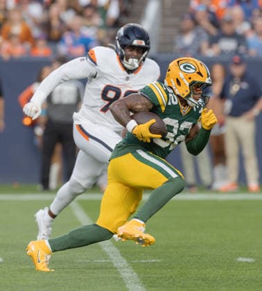 August 21, 2026, Denver, Colorado, USA: Packers RB MARSHAWN LLOYD runs for the end zone as he scores the Packers 1st. TD of the game during the 1st. Half at Empower Field at Mile High Friday evening. Packers beat the Broncos in Pre-Season 33-13. Credit Image: ZUMA Press Wire) NFL, American Football Herren, USA Pre-Season 2026 - Packers Beat The Broncos In Pre-Season 33-13 Friday Evening.  - ZUMAav4_ 20260821_zaf_av4_012 Copyright: xHectorxAcevedox