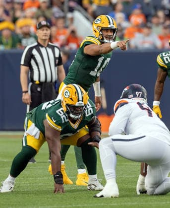 August 21, 2026, Denver, Colorado, USA: Packers QB JORDAN LOVE points to a Broncos defender ready to blitz to his offensive line during the 1st. Half at Empower Field at Mile High Friday evening. Packers beat the Broncos in Pre-Season 33-13. Credit Image: ZUMA Press Wire) Denver USA - ZUMAav4_ 20260821_zaf_av4_004 Copyright: xHectorxAcevedox