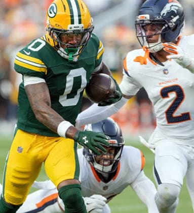 August 21, 2026, Denver, Colorado, USA: Packers WR MATTHEW GOLDEN catches a pass in traffic as Broncos CB PAT SURTAIN ll closes in during the 1st. Half at Empower Field at Mile High Friday evening. Packers beat the Broncos in Pre-Season 33-13. Credit Image: ZUMA Press Wire) Denver USA - ZUMAav4_ 20260821_zaf_av4_010 Copyright: xHectorxAcevedox