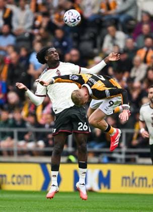 Ayden Heaven of Manchester United, ManU fouls Oliver McBurnie of Hull City Hull City v Manchester United, Premier League Football, Football, MKM Stadium, Hull, UK - 22 Aug 2026Hull MKM Stadium United Kingdom EDITORIAL USE ONLY No use with unauthorised audio, video, data, fixture lists, club league logos or live services. Online in-match use limited to 120 images, no video emulation. No use in betting, games or single club league player publications.  Copyright: xGreigxCowie Shutterstockx 17111325aj