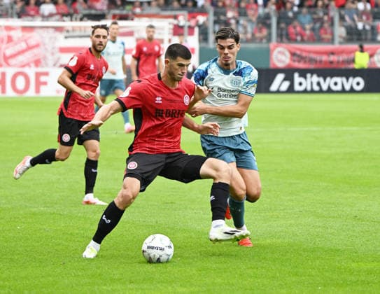 DFB-Pokal 2026 27 1. Runde Wiesbaden SV Wehen Wiesbaden (svww) - Bayer Leverkusen (lev) Moritz FLOTHO (SV Wehen-Wiesbaden), li - MIGUEL (Bayer Leverkusen) DFB-Pokal *** 2026-27 DFB Cup, First Round: Wiesbaden SV Wehen Wiesbaden (SVWW) vs. Bayer Leverkusen (Lev) Moritz FLOTHO (SV Wehen Wiesbaden), li MIGUEL (Bayer Leverkusen) DFB Cup