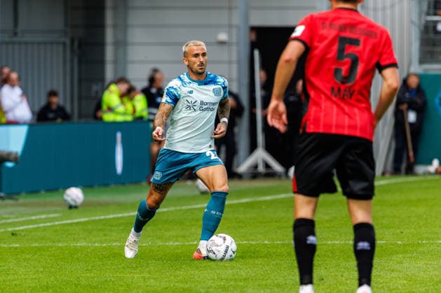 WIESBADEN, GERMANY - AUGUST 22: Aleix Garcia (Bayer 04 Leverkusen, 24) runs with the ball during the first-round match between SV Wehen Wiesbaden vs. Bayer 04 Leverkusen at Brita Arena of the German Cup on August 22, 2026 in Wiesbaden, Germany. DFL REGULATIONS PROHIBIT ANY USE OF PHOTOGRAPHS AS IMAGE SEQUENCES AND OR QUASI-VIDEO. Hessen Germany Copyright: xStephanxHahnex