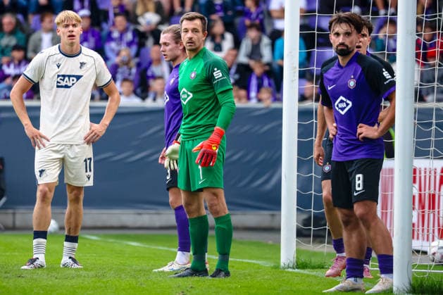 v.l. Nathan De Cat (TSG 1899 Hoffenheim, 17), Devin Angleberger (FC Erzgebirge Aue, 03), Martin Maennel (FC Erzgebirge Aue, 01), Nils Lihsek (FC Erzgebirge Aue, 08), FC Erzgebirge Aue vs. TSG Hoffenheim, Fussball, DFB Pokal, 1. Runde, Saison 2026 2027, 22.08.2026,¨ DFL REGULATIONS PROHIBIT ANY USE OF PHOTOGRAPHS AS IMAGE SEQUENCES AND OR QUASI-VIDEO,¨ FC Erzgebirge Aue vs. TSG Hoffenheim, Fussball, DFB Pokal, 1. Runde, Saison 2026 2027, 22.08.2026, Aue *** v l Nathan De Cat, TSG 1899 Hoffenheim, 17, Devin Angleberger, FC Erzgebirge Aue, 03, Martin Maennel, FC Erzgebirge Aue, 01, Nils Lihsek FC Erzgebirge Aue, 08, FC Erzgebirge Aue vs. TSG Hoffenheim, Soccer, DFB Cup, 1st Round, 2026–2027 Season, August 22, 2026, DFL regulations prohibit any use of photographs as image sequences and or quasi-video, FC Erzgebirge Aue vs. TSG Hoffenheim, Soccer, DFB Cup, Round 1, 2026–2027 Season, August 22, 2026, Aue Copyright: xEibner-Pressefoto LauraxRoemerx EP_LRR