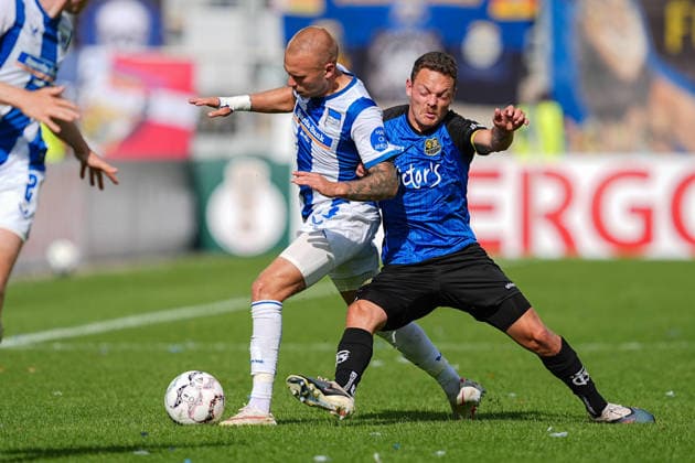 22.08.2026, xydrx, Fußball, DFB Pokal, 1. FC Saarbrücken - Hertha BSC, Saison 2026 2027, Ludwigsparkstadion: Jon Dagur Thorsteinsson (Hertha BSC, 23) im Zweikampf gegen Patrick Sontheimer (1.FC Saarbruecken, 6) DFB regulations prohibit any use of photographs as image sequences and or quasi-video. *** August 22, 2026, xydrx, soccer, DFB Cup, 1 FC Saarbrücken vs. Hertha BSC, 2026–2027 season, Ludwigspark Stadium, Jon Dagur Thorsteinsson (Hertha BSC), No. 23 in a tackle against Patrick Sontheimer (1 FC Saarbrücken), 6. DFB regulations prohibit any use of photographs as image sequences and or quasi-video. Copyright: HMBxMedia YannisxDreimann