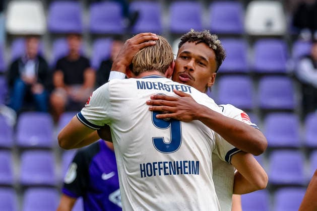 Bambase Conte (TSG 1899 Hoffenheim, 20) umarmung fuer Max Moerstedt (TSG 1899 Hoffenheim, 09), Jubel, Torjubel, jubelt ueber Tor zum 0:4, FC Erzgebirge Aue vs. TSG Hoffenheim, Fussball, DFB Pokal, 1. Runde, Saison 2026 2027, 22.08.2026,¨ DFL REGULATIONS PROHIBIT ANY USE OF PHOTOGRAPHS AS IMAGE SEQUENCES AND OR QUASI-VIDEO,¨ FC Erzgebirge Aue vs. TSG Hoffenheim, Fussball, DFB Pokal, 1. Runde, Saison 2026 2027, 22.08.2026, Aue *** Bambase Conte TSG 1899 Hoffenheim, 20 hugs for Max Moerstedt TSG 1899 Hoffenheim, 09, celebration, goal celebration, celebrating the 0-4 goal, FC Erzgebirge Aue vs. TSG Hoffenheim, soccer, DFB Cup, 1st round, 2026–2027 season, August 22, 2026, DFL regulations prohibit any use of photographs as image sequences and or quasi-video, FC Erzgebirge Aue vs. TSG Hoffenheim, soccer, DFB Cup, Round 1, 2026–2027 Season, August 22, 2026, Aue Copyright: xEibner-Pressefoto LauraxRoemerx EP_LRR