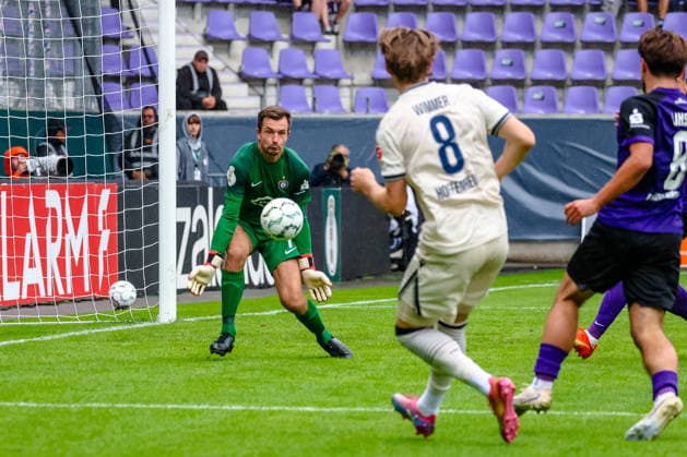 Martin Maennel (FC Erzgebirge Aue, 01) haelt Schuss von Patrick Wimmer (TSG 1899 Hoffenheim, 08), FC Erzgebirge Aue vs. TSG Hoffenheim, Fussball, DFB Pokal, 1. Runde, Saison 2026 2027, 22.08.2026,¨ DFL REGULATIONS PROHIBIT ANY USE OF PHOTOGRAPHS AS IMAGE SEQUENCES AND OR QUASI-VIDEO,¨ FC Erzgebirge Aue vs. TSG Hoffenheim, Fussball, DFB Pokal, 1. Runde, Saison 2026 2027, 22.08.2026, Aue *** Martin Maennel (FC Erzgebirge Aue), 01, saves a shot by Patrick Wimmer (TSG 1899 Hoffenheim), 08, FC Erzgebirge Aue vs. TSG Hoffenheim, Soccer, DFB Cup, 1st Round, 2026–2027 Season, August 22, 2026, DFL regulations prohibit any use of photographs as image sequences and or quasi-video, FC Erzgebirge Aue vs. TSG Hoffenheim, Soccer, DFB Cup, Round 1, 2026–2027 Season, August 22, 2026, Aue Copyright: xEibner-Pressefoto LauraxRoemerx EP_LRR