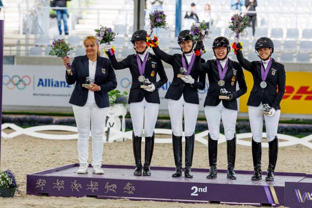AACHEN - FEI World Championships 2026, AACHEN - FEI World Championships 2026 Team Germany DRESING Heidemarie (GER), MISPELKAMP Regine (GER), BRANDT Helen (GER), NIEHUES Anna-Lena (GER), FÜTTERER-SOMMER Silke (Bundestrainerin) Medal ceremony Team Medaillenvergabe Team FEI Para-Dressage World Championship, WM, Weltmeisterschaft Team Ranking Aachen, Reitstadion Soers 22. August 2026 - *** AACHEN FEI World Championships 2026, AACHEN FEI World Championships 2026 Team Germany: Heidemarie Dresing (GER), Regine Mispelkamp (GER), Helen Brandt (GER), NIEHUES Anna Lena GER, FÜTTERER SOMMER Silke (National Team Coach) Medal Ceremony Team Medal Presentation Team FEI Para Dressage World Championship Team Ranking Aachen, Soers Equestrian Stadium, August 22, 2026
