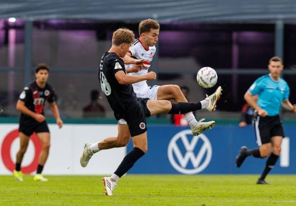 22.08.2026 - Fussball - Saison 2026 2027 - DFB Pokal Vereinspokal - 01. Runde: Viktoria Köln - 1. FC Nürnberg Nuernberg FCN ( Club ) - Sportfoto Zink DaMa - xdaxmax - regulations prohibit any use of photographs as image sequences and or quasi-video - Tim Kloss (18, FC Viktoria Köln ) Adam Markhiev (6, 1. FC Nürnberg FCN ) *** August 22, 2026 Soccer Season 2026–2027 DFB Cup Club Cup First Round Viktoria Cologne 1 FC Nuremberg Nuremberg FCN Club Sports Photo Zink DaMa xdaxmax regulations prohibit any use of photographs as image sequences and or quasi-video Tim Kloss 18, FC Viktoria Cologne Adam Markhiev 6, 1 FC Nuremberg FCN