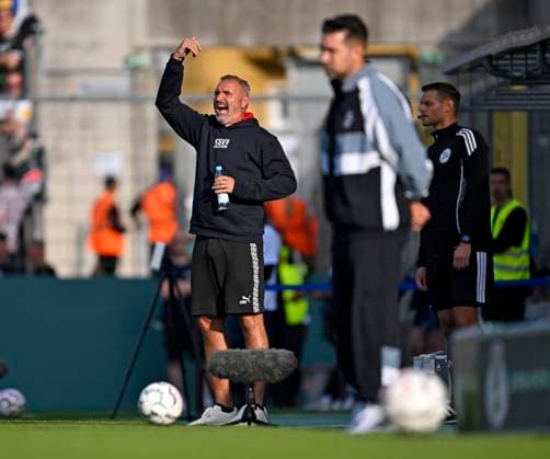 22.08.2026, Fussball DFB-Pokal 2026 27, 1.Runde, TSV 1860 München - Holstein Kiel, im Stadion an der Grünwalderstrasse in München, v.l. Trainer Tim Walter (Holstein Kiel) und Trainer Alper Kayabunar (TSV 1860 München) ***DFL and DFB regulations prohibit any use of photographs as image sequences and or quasi-video.*** *** August 22, 2026, Soccer: 2026-27 DFB Cup, First Round, TSV 1860 Munich vs. Holstein Kiel, at the Grünwalderstrasse Stadium in Munich; from left: Coach Tim Walter (Holstein Kiel) and Coach Alper Kayabunar (TSV 1860 Munich) ***DFL and DFB regulations prohibit any use of photographs as image sequences and or quasi-video***
