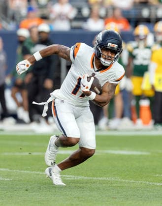 August 22, 2026, Denver, Colorado, USA: Broncos WR JAYLEN WADDLE starts his run to the sidelines after a catch during the 1st. Half at Empower Field at Mile High Friday evening. Packers beat the Broncos in Pre-Season 33-13. Credit Image: ZUMA Press Wire) Denver USA - ZUMAav4_ 20260822_zaf_av4_003 Copyright: xHectorxAcevedox