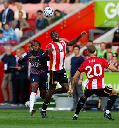 Mathys Tel of Tottenham Hotspur and Michael Kayode of Brentford compete for the ball Brentford v Tottenham Hotspur, Premier League, Football, Gtech Community Stadium, London, UK - 22 Aug 2026London Gtech Community Stadium United Kingdom EDITORIAL USE ONLY No use with unauthorised audio, video, data, fixture lists, club league logos or live services. Online in-match use limited to 120 images, no video emulation. No use in betting, games or single club league player publications.  Copyright: xMattxImpey Shutterstockx 17112717p