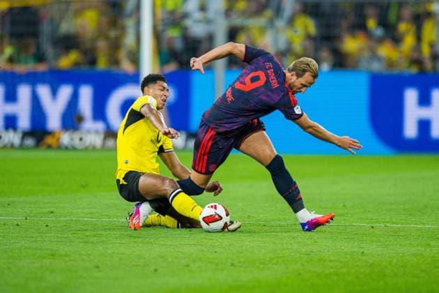 22.08.2026 - Fußball, 2026 2027, Franz-Beckenbauer-Supercup, Borussia Dortmund - FC Bayern München: (L-R) Jobe Bellingham (Dortmund), Harry Kane (München) DFB REGULATIONS PROHIBIT ANY USE OF PHOTOGRAPHS AS IMAGE SEQUENCES AND OR QUASI-VIDEO. *** August 22, 2026 Soccer, 2026–2027, Franz Beckenbauer Super Cup, Borussia Dortmund vs. FC Bayern Munich, L R Jobe Bellingham (Dortmund), Harry Kane (Munich). DFB regulations prohibit any use of photographs as image sequences and or quasi-video.