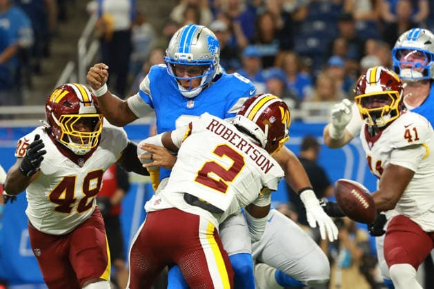 Washington Commanders vs Detroit Lions DETROIT,MICHIGAN-AUGUST 22: Quarterback Joshua Dobbs 6 of the Detroit Lions gets sacked by cornerback Amik Robertson 2 of the Washington Commanders during the first half of an NFL, American Football Herren, USA preseason football game between the Washington Commanders and the Detroit Lions in Detroit, Michigan USA, on Saturday, August 22, 2026 Detroit Michigan United States  Copyright: xJorgexLemusx originalFilename:lemus-washingt260822_npUuQ.jpg
