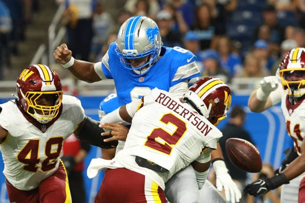Washington Commanders vs Detroit Lions DETROIT,MICHIGAN-AUGUST 22: Quarterback Joshua Dobbs 6 of the Detroit Lions gets sacked by cornerback Amik Robertson 2 of the Washington Commanders during the first half of an NFL, American Football Herren, USA preseason football game between the Washington Commanders and the Detroit Lions in Detroit, Michigan USA, on Saturday, August 22, 2026 Detroit Michigan United States  Copyright: xJorgexLemusx originalFilename:lemus-washingt260822_npWPz.jpg