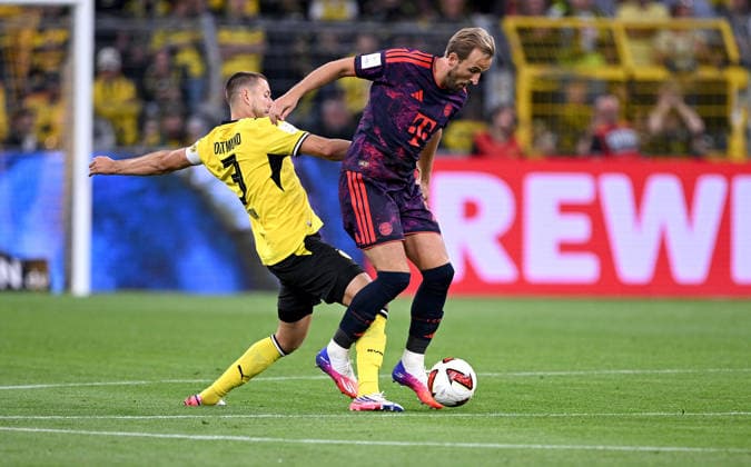 Fussball Supercup Saison 2026 2027 22.08.2026 Borussia Dortmund - FC Bayern Muenchen Waldemar Anton (li, Borussia Dortmund) gegen Harry Kane (re, FC Bayern Muenchen) *** Soccer Super Cup, 2026–2027 Season, August 22, 2026: Borussia Dortmund vs. FC Bayern Munich—Waldemar Anton (left), Borussia Dortmund, vs. Harry Kane (right), FC Bayern Munich