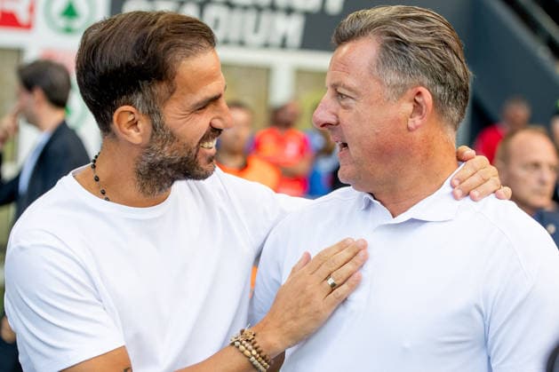 SOCCER - Serie A - Udinese Calcio vs. Como 1907 Photo by IPA ABACAPRESS.COM87700104 - Como Head Coach Cesc Fabregas greets Udinese Head Coach Kosta Runjaic during the Serie A soccer match between Udinese Calcio and Como 1907 in Udine, Italy, on August 22, 2026 Udine Italy  Copyright: xIPAxSport ABACAx