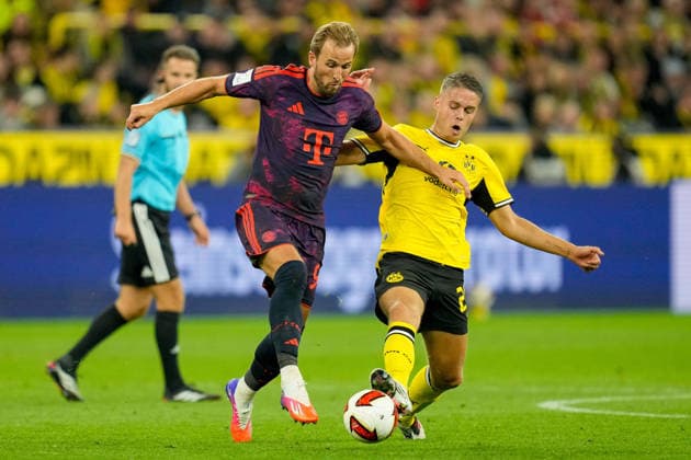 Harry Kane (FC Bayern Muenchen) und Joey Veerman (Borussia Dortmund) battle for the ball during the Franz Beckenbauer Supercup match between Borussia Dortmund and FC Bayern Muenchen at Signal Iduna Park on August 22, 2026 in Dortmund, Germany. (Photo by Alex Gottschalk DeFodi Images) - *** Harry Kane of FC Bayern Munich and Joey Veerman of Borussia Dortmund battle for the ball during the Franz Beckenbauer Super Cup match between Borussia Dortmund and FC Bayern Munich at Signal Iduna Park on August 22, 2026, in Dortmund, Germany. Photo by Alex Gottschalk, DeFodi Images