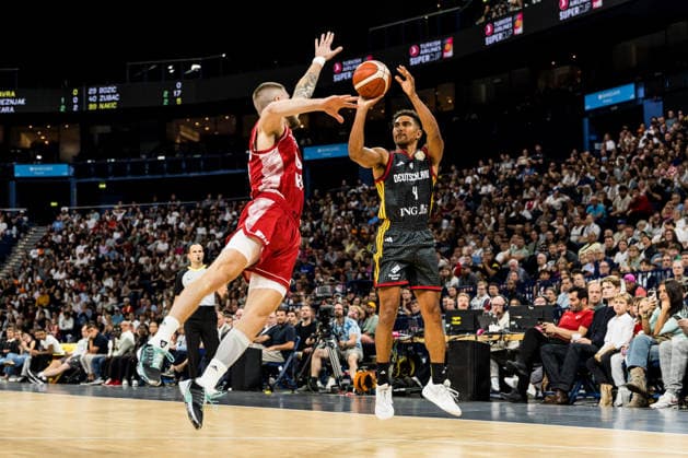 HAMBURG, GERMANY - AUGUST 22: Maodo Lo (Germany, 4) shooting a ball during the Turkish Airlines Basketball Supercup final match between Germany vs. Croatia at Barclays Arena on August 22, 2026 in Hamburg, Germany. Hamburg Germany Copyright: xSteffiexWunderlx