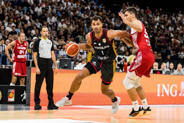 HAMBURG, GERMANY - AUGUST 22: Oscar Da Silva (Germany, 1) controls the ball during the Turkish Airlines Basketball Supercup final match between Germany vs. Croatia at Barclays Arena on August 22, 2026 in Hamburg, Germany. Hamburg Germany Copyright: xSteffiexWunderlx