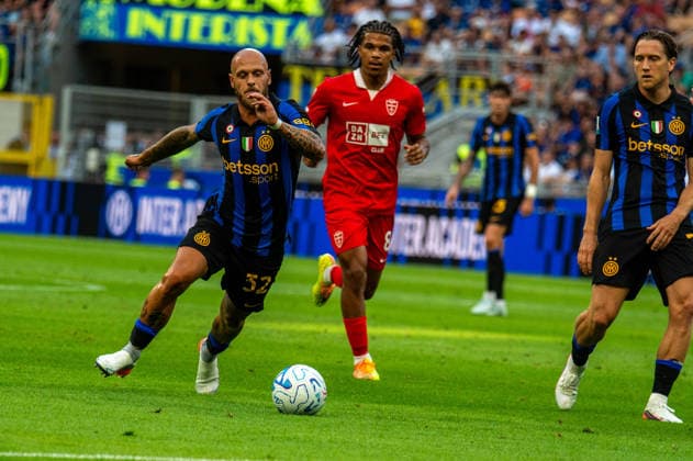 SOCCER - Serie A - Inter - FC Internazionale vs. AC Monza Photo by IPA ABACAPRESS.COM87702949 - Federico Dimarco tackles Ondoa during the Serie A match between FC Internazionale and AC Monza at Stadio Giuseppe Meazza in Milan, Italy, on August 22, 2026. Milan Italy  Copyright: xIPAxSport ABACAx