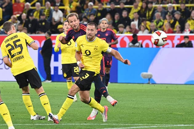 Harry KANE (M) Torchance, Torschuss, -gegen Waldemar ANTON (DO) Aktion, Zweikampf, Fussball DFL Franz Beckenbauer Supercup 2026 Borussia Dortmund - FC Bayern Muenchen 1-2 am 22.08.2026 in Dortmund Deutschland. DFL regulations prohibit any use of photographs as image sequences and or quasi-video Â *** Harry KANE M Scoring chance, shot on goal, against Waldemar ANTON DO, play, tackle, soccer, DFL Franz Beckenbauer Super Cup 2026, Borussia Dortmund vs. FC Bayern Munich 1–2 on August 22, 2026, in Dortmund, Germany. DFL regulations prohibit any use of photographs as image sequences and or quasi-video.