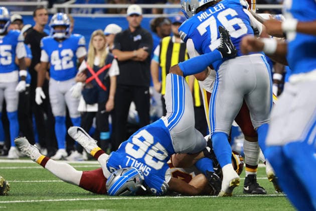 Washington Commanders vs Detroit Lions DETROIT,MICHIGAN-AUGUST 22: Running back Jabari Small 26 of the Detroit Lions gets tackled by linebacker Leo Chenal 54 of the Washington Commanders during an NFL, American Football Herren, USA preseason football game between the Washington Commanders and the Detroit Lions in Detroit, Michigan USA, on Saturday, August 22, 2026 Detroit Michigan United States  Copyright: xJorgexLemusx originalFilename:lemus-washingt260822_npYZv.jpg