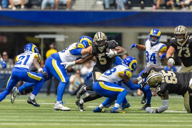 INGLEWOOD, CA - AUGUST 22: Kendre Miller 5 of the New Orleans Saints carries the ball through heavy traffic during an NFL, American Football Herren, USA preseason game between the New Orleans Saints and the Los Angeles Rams on August 22, 2026, at SoFi Stadium in Inglewood, California. (Photo by Greg Fiore Icon Sportswire) NFL: AUG 22 Saints at Rams EDITORIAL USE ONLY Icon2608220909