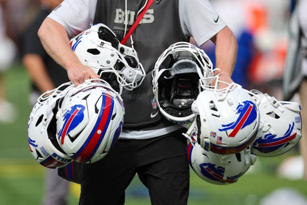 CLEVELAND, OH - AUGUST 22: A Buffalo Bills equipment manager carries Bills helmets to the locker room following the National Football League preseason game between the Buffalo Bills and Cleveland Browns on August 22, 2026, at Huntington Bank Field in Cleveland, OH. (Photo by Frank Jansky Icon Sportswire) NFL, American Football Herren, USA AUG 22 Bills at Browns EDITORIAL USE ONLY Icon260822038