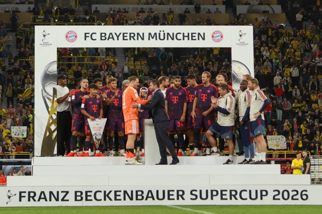 Dortmund, Deutschland: 22.08.2026 - Franz Beckenbauer Supercup 2026 - Borussia Dortmund vs. FC Bayern München Im Bild: Supercup Pokal Übergabe an die Spieler des FC Bayern München auf dem Siegertreppchen mit dem Schriftzug FC Bayern München - Franz Beckenbauer Supercup 2026 (DFL DFB REGULATIONS PROHIBIT ANY USE OF PHOTOGRAPHS as IMAGE SEQUENCES and or QUASI-VIDEO) *** *** Dortmund, Germany August 22, 2026 Franz Beckenbauer Super Cup 2026 Borussia Dortmund vs. FC Bayern Munich Pictured: Super Cup trophy presentation to the FC Bayern Munich players on the winners podium, featuring the inscription FC Bayern Munich Franz Beckenbauer Super Cup 2026 DFL DFB REGULREGULATIONS PROHIBIT ANY USE OF PHOTOGRAPHS AS IMAGE SEQUENCES AND OR QUASI-VIDEO *** Copyright: HMBxMedia MadeleinexFantini
