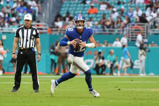 MIAMI GARDENS, FL - AUGUST 22: New York Giants quarterback Brandon Allen (12) looks for a receiver as he rolls out in the second half during the preseason NFL, American Football Herren, USA game between the New York Giants and the Miami Dolphins on Saturday, August 22, 2026 at Hard Rock Stadium in Miami, FL (Photo by Peter Joneleit Icon Sportswire) NFL: AUG 22 Giants at Dolphins EDITORIAL USE ONLY Icon260822022