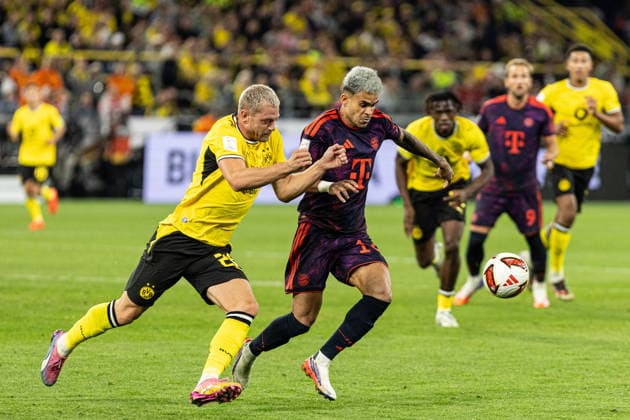 Franz-Beckenbauer-Supercup 2026: Borussia Dortmund - FC Bayern München; 22.08.2026 Julian Ryerson (Borussia Dortmund, 26), Luis Diaz (FC Bayern München, 14) Franz-Beckenbauer-Supercup 2026: Borussia Dortmund - FC Bayern München; Signal Iduna Park, Dortmund; 22.08.2026 *** Franz Beckenbauer Super Cup 2026 Borussia Dortmund vs. FC Bayern Munich, August 22, 2026 Julian Ryerson, Borussia Dortmund, 26, Luis Diaz, FC Bayern Munich, 14. Franz Beckenbauer Super Cup 2026: Borussia Dortmund vs. FC Bayern Munich at Signal Iduna Park, Dortmund, August 22, 2026 Copyright: xBEAUTIFULxSPORTS Buriakovx