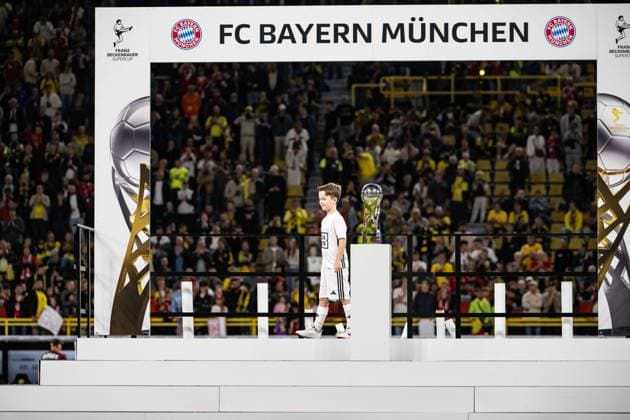 Kind mit Pokal, Borussia Dortmund vs. FC Bayern Muenchen, Fussball, Franz Beckenbauer Supercup, 22.08.2026 DFB regulations prohibit any use of photographs as image sequences and or quasi-video Dortmund Nordrhein-Westfalen Deutschland *** Child with trophy, Borussia Dortmund vs. FC Bayern Munich, soccer, Franz Beckenbauer Super Cup, August 22, 2026. DFB regulations prohibit any use of photographs as image sequences and or quasi-video. Dortmund, North Rhine-Westphalia, Germany Copyright: xkolbert-press MarcxNiemeyerx