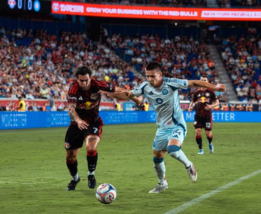 August 22, 2026, Harrison, New Jersey, USA: CADE COWELL (7) of the New York Red Bulls battles for the ball with VIKTOR RADOJEVIC (14) of Chicago Fire during a Major League Soccer match at Sports Illustrated Stadium. MLS, Fussball Herren, USA 2026: New York Red Bullls 1:1 Chicago Fire  - ZUMAp306 20260822_znp_p306_006 Copyright: xOmarxPerezxLopezx