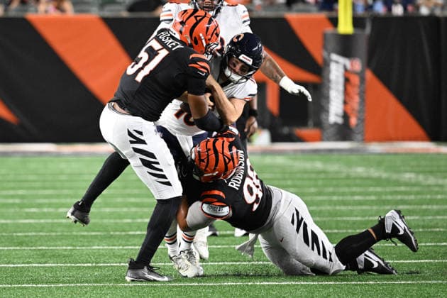 August 22, 2026: Cincinnati Bengals defensive end Isaiah Foskey (51) and Cincinnati Bengals defensive tackle T.J. Slaton Jr. (98) hit Chicago Bears quarterback Miller Moss (16) in their game in Cincinnati, Ohio. Cal Media Cincinnati USA - ZUMAc04_ 20260822_zma_c04_392 Copyright: xBrentxClarkx