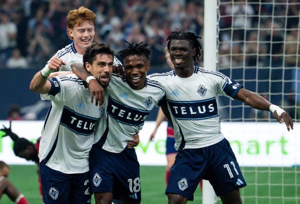 August 22, 2026, Vancouver, Bc, CANADA: Vancouver Whitecaps Brian White, left, celebrates his goal against FC Dallas with Edier Ocampo (18), Emmanuel Sabbi (11) and Oliver Larraz, back, during the first half of an MLS, Fussball Herren, USA soccer match in Vancouver, on Saturday, August 22, 2026. Canada News - August 22, 2026  - ZUMAc35_ 20260822_zaf_c35_205 Copyright: xEthanxCairnsx