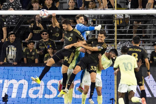 August 22, 2026, Los Angeles, California, USA: Portland Timbers goalkeeper James Pantemis (41) makes save against Los Angeles FC defenders Ryan Hollingshead (24) and Aaron Long (33) during a MLS, Fussball Herren, USA soccer game at BMO Stadium on Saturday, Aug. 22, 2026 in Los Angeles. Los Angeles USA - ZUMAc68_ 20260822_zaf_c68_180 Copyright: xRingoxChiux