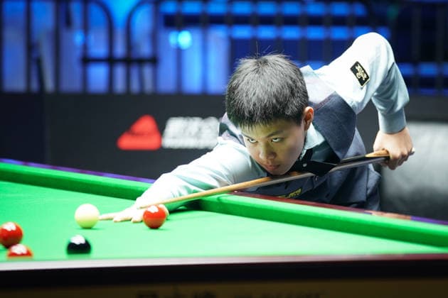 WUHAN, CHINA - AUGUST 23: Wang Xinzhong of China plays a shot in the first round match against Ben Mertens of Belgium on day 1 of Wuhan Open 2026 at the Optics Valley Gymnasium of Huazhong University of Science and Technology on August 23, 2026 in Wuhan, Hubei Province of China.  Copyright: xTaixChengzhex 111661617831