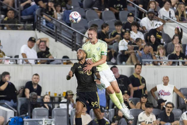 August 22, 2026, Los Angeles, California, United States: Portland Timbers defender Finn Surman (20) and Los Angeles FC forward DÃ nis Bouanga (99) vie for the ball during a MLS, Fussball Herren, USA soccer game. Final scores; LAFC 1:1 Portland Timbers. Los Angeles United States - ZUMAs197 20260822_aaa_s197_441 Copyright: xRingoxChiux