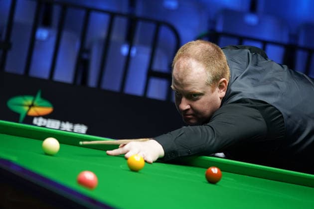 WUHAN, CHINA - AUGUST 23: Jordan Brown of Northern Ireland plays a shot in the first round match against Chris Wakelin of England on day 1 of Wuhan Open 2026 at the Optics Valley Gymnasium of Huazhong University of Science and Technology on August 23, 2026 in Wuhan, Hubei Province of China.  Copyright: xTaixChengzhex 111661654912