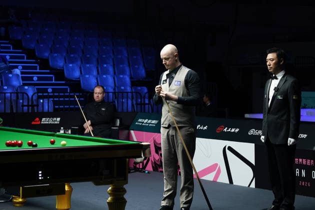 WUHAN, CHINA - AUGUST 23: Chris Wakelin of England chalks the cue in the first round match against Jordan Brown of Northern Ireland on day 1 of Wuhan Open 2026 at the Optics Valley Gymnasium of Huazhong University of Science and Technology on August 23, 2026 in Wuhan, Hubei Province of China.  Copyright: xTaixChengzhex 111661654918