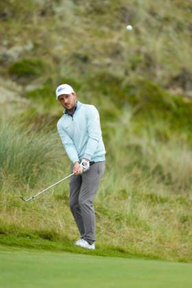 BALMEDIE, SCOTLAND - AUG 23: Lukas Nemecz (AUT) chips to the 1st green during Round 4 at the 2026 Nexo Championship at the Trump International Golf Links, Balmedie on August 23, 2026 in Aberdeenshire, Scotland The 2026 Nexo Championship