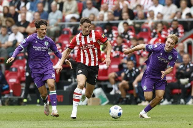 EINDHOVEN , 23-08-2026 , Philips stadium , season 2026 202 , Dutch Eredivisie football , match between PSV and FC Gronngen , picture shows PSV player Ruben van Bommel , FC Groningen player Thom van Bergen PSV - Groningen  x205973902x Copyright: