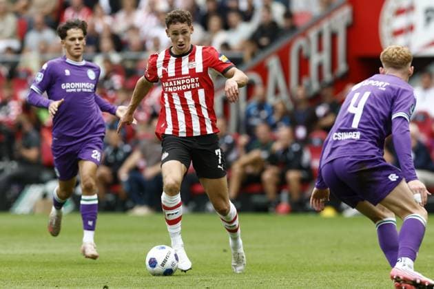 EINDHOVEN , 23-08-2026 , Philips stadium , season 2026 202 , Dutch Eredivisie football , match between PSV and FC Gronngen , picture shows PSV player Ruben van Bommel , FC Groningen player Thom van Bergen PSV - Groningen  x205973909x Copyright: