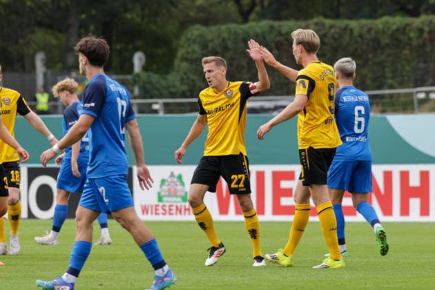 23.08.2026, xgrfx, Fussball DFB Pokal 1.Runde, SV Westfalia Rhynern - Dynamo Dresden v.l. Tor, Niklas Hauptmann zum 0:2 (Dynamo Dresden) (DFL DFB REGULATIONS PROHIBIT ANY USE OF PHOTOGRAPHS as IMAGE SEQUENCES and or QUASI-VIDEO) Münster *** August 23, 2026, xgrfx, Soccer, DFB Cup 1st Round, SV Westfalia Rhynern vs. Dynamo Dresden, goal, Niklas Hauptmann scores the 0–2 goal for Dynamo Dresden. DFL and DFB regulations prohibit any use of photographs as image sequences and or quasi-video. Münster
