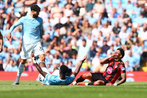 Evanilson of AFC Bournemouth holds his face after a challenge from Josko Gvardiol of Manchester City Manchester City v AFC Bournemouth, Premier League Football, Football, Etihad Stadium, Manchester, UK - 23 Aug 2026Manchester Etihad Stadium United Kingdom EDITORIAL USE ONLY No use with unauthorised audio, video, data, fixture lists, club league logos or live services. Online in-match use limited to 120 images, no video emulation. No use in betting, games or single club league player publications.  Copyright: xPaulxCurrie Shutterstockx 17112312av